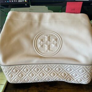Tory Burch pastel color. Dusty pink used only twice it is in great condition.